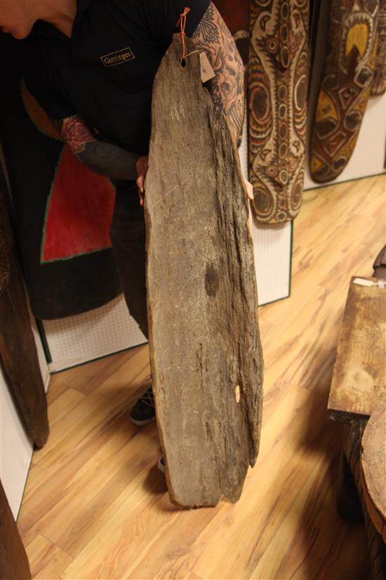 A Sepik River wooden ancestor spirit board and two other boards